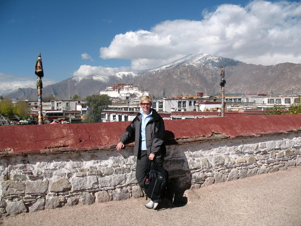 Me on the roof of the Jokhang with the Potala Palace in the background