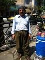 Sanandaj - Kurdish man selling cool drinks