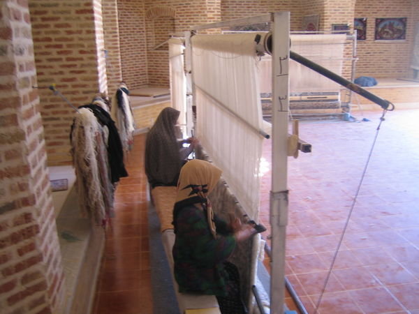Women making carpets in Kharanaq