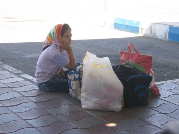 Little girl waiting in Yazd bus station
