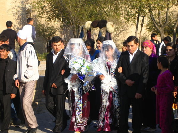 Khiva - Wedding with brides wearing traditional clothes