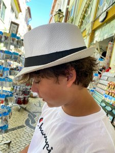 trying on Fedora hats