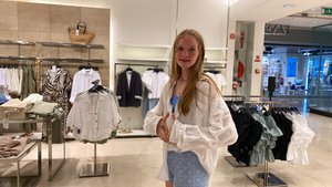 Camille loves shopping in Portugal!