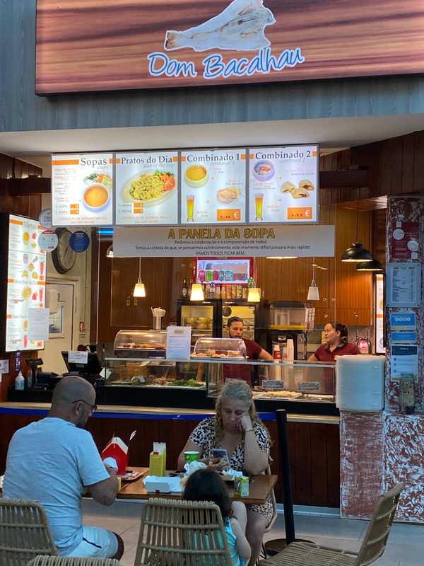 you can buy beer with most meals at the food court in the mall
