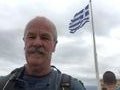 Greek flag atop the Acropolis and very near the Parthenon. All Greek to me.