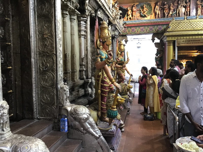 Some of the devout inside the temple.
