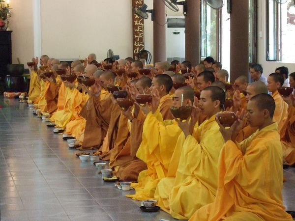 Monks having their one meal a day