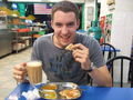 Paul enjoying his Roti Canai and Teh Tarik (sweet tea)