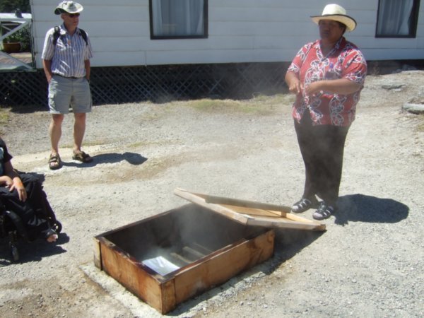 A hangi is prepared in underground thermal ovens