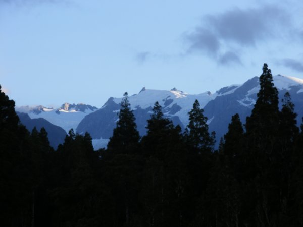 Our evening view of the sun setting over the Southern Alps from the Franz Joseph campsite