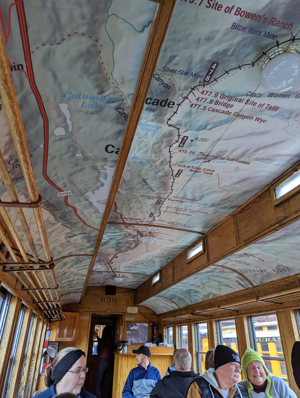 When we boarded our train, we found the route printed on the ceiling!