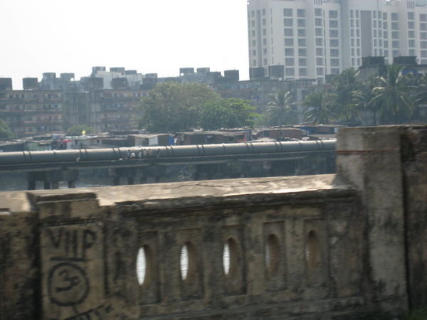 People using sewage pipeline as bridge