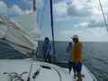 Captain and Crew Raising the Sails