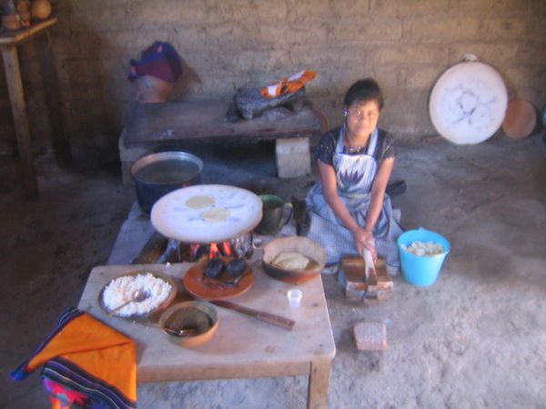 San Juan Chamula- Mayan girl making some fresh tortillas