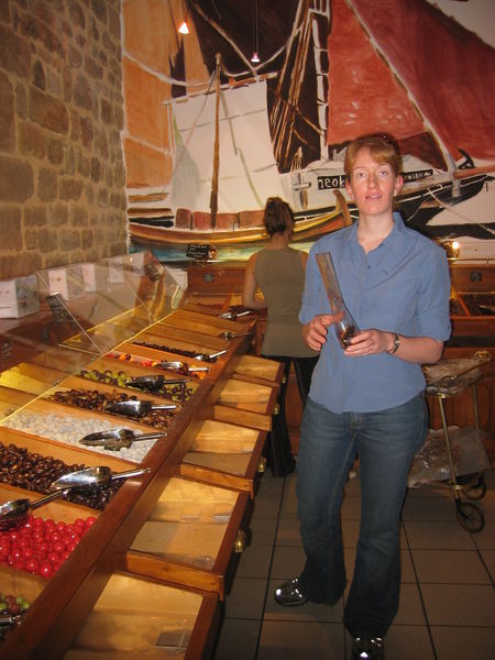 Sally choosing chocolates at Auray