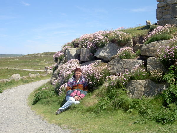 Myself surrounded by the lovely flowers at Land's End
