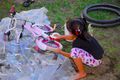 Angel cleans her bike
