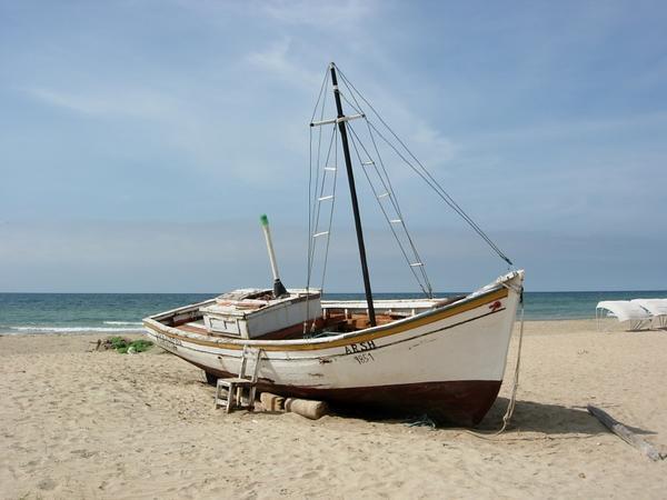 Classic fishing boat beached for repairs?