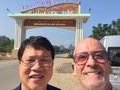Me and Mr Hieu at the gateway to Ha Giang Province