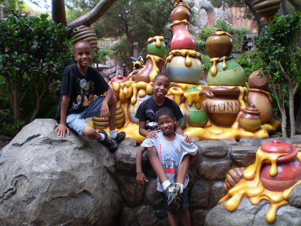 Posing outside the Winnie the Pooh ride