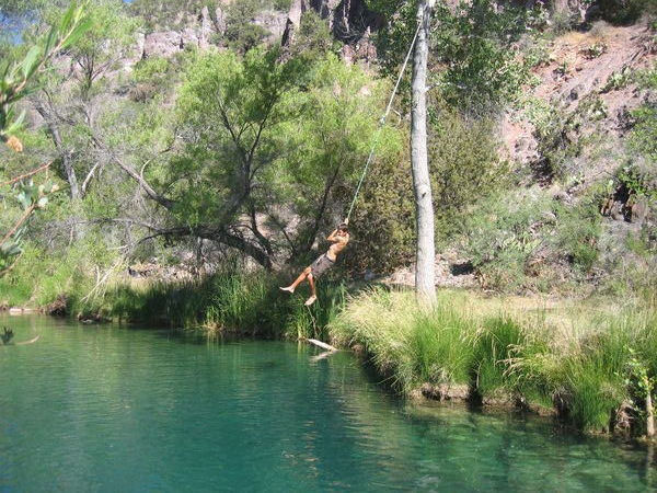 Bryce swinging on a rope swing