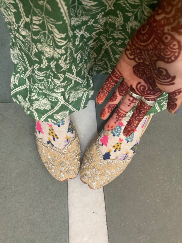 The tiniest shoes and henna