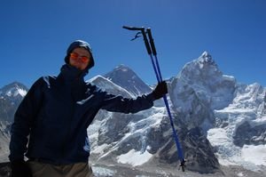 Mark on the summit of Kala Patar with Everest and Lhotse in the background