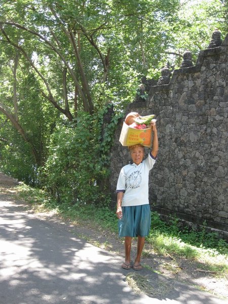 Common to see woman carrying loads on their heads