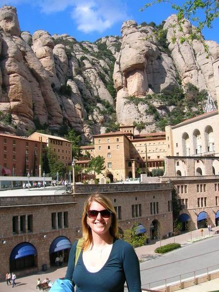 Lynne looking up at Montserrat Monastery