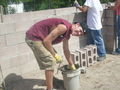 Chris scooping concrete