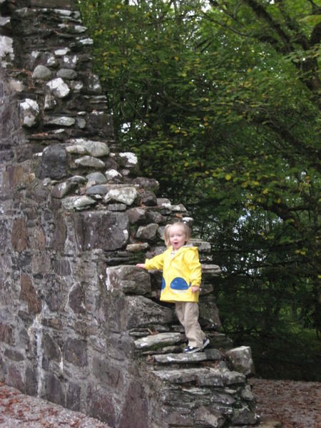 Camill climbing on the ruins of a 13th century chapel