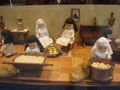 Creepy doll nuns making marzipan