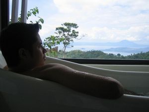 Pondering in the tub overlooking Taal lake