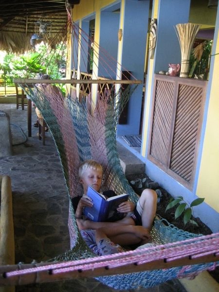 Kyle relaxing with a good book at Cabinas Guaranas