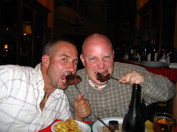 Eating Steak Like Men Photo