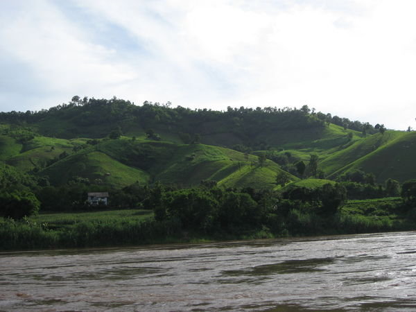 the green hills of thailand from the boat