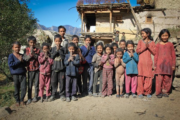 Children at the entrance of Rimi village