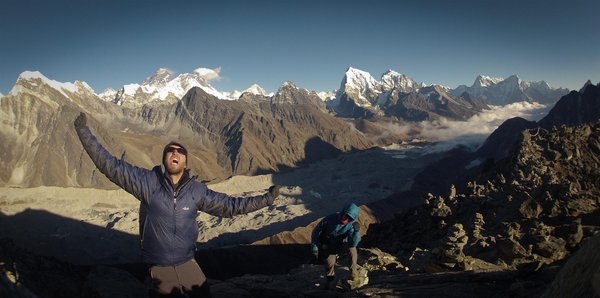 Himalayan dreamers from Gokyo Ri (5355m). Debris covered Ngozumba Glacier, Everest, Lhotse, Cholatse and friends loaming behind.