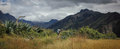 Leaving the Andean village of Yanama through farming lands towards the Quebrada Huaripampa. The acutal glaciated peaks are hidden in thick clouds, unusual for the time of the year.