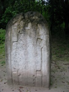 Stone with a royal figue at Tikal