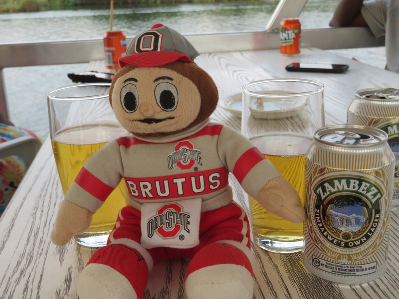 Brutus sips a Zambezi beer