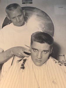 Elvis get a haircut for the service