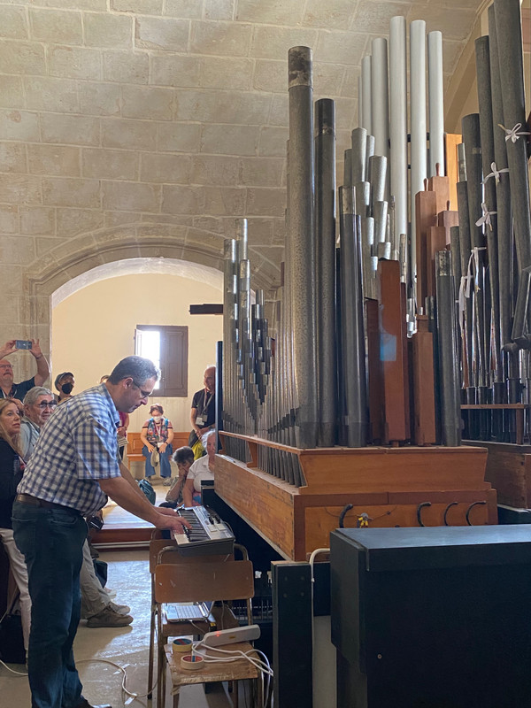 Master organist demonstrating his pipe organ