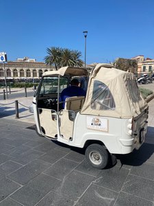 Transport via tuk tuk in Taormina