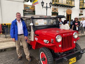 Dave next to one of the iconic Willys Jeeps