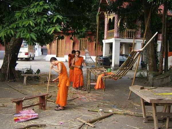 Monks building a boat