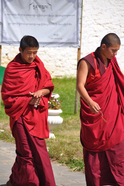 Monks leaving prayer