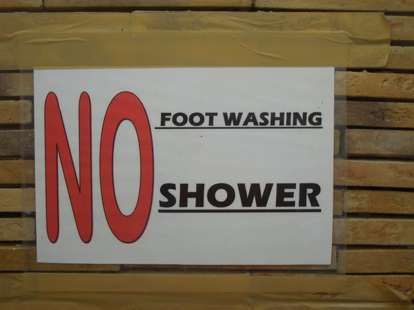 Sign above the toilet