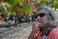 Sampling one of the grapes