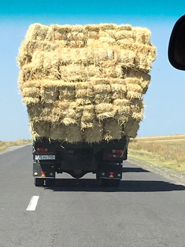 Hay bales on the move
